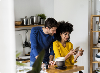 Couple viewing Zillow Rental Manager paid services